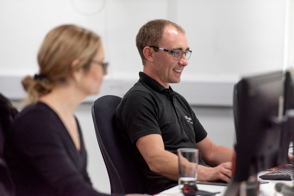 Employee reviewing a simulated phishing email during cybersecurity training