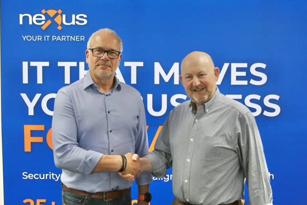 MD Stuart Wilson shakes hands with Devon and Somerset Law Society Leader Tony Steiner to announce Nexus as the new IT Partner